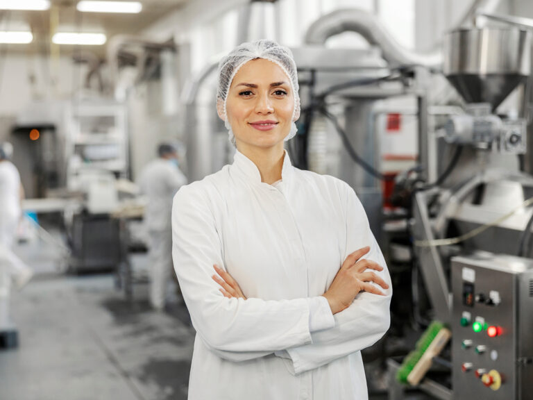Woman in a food processing factory